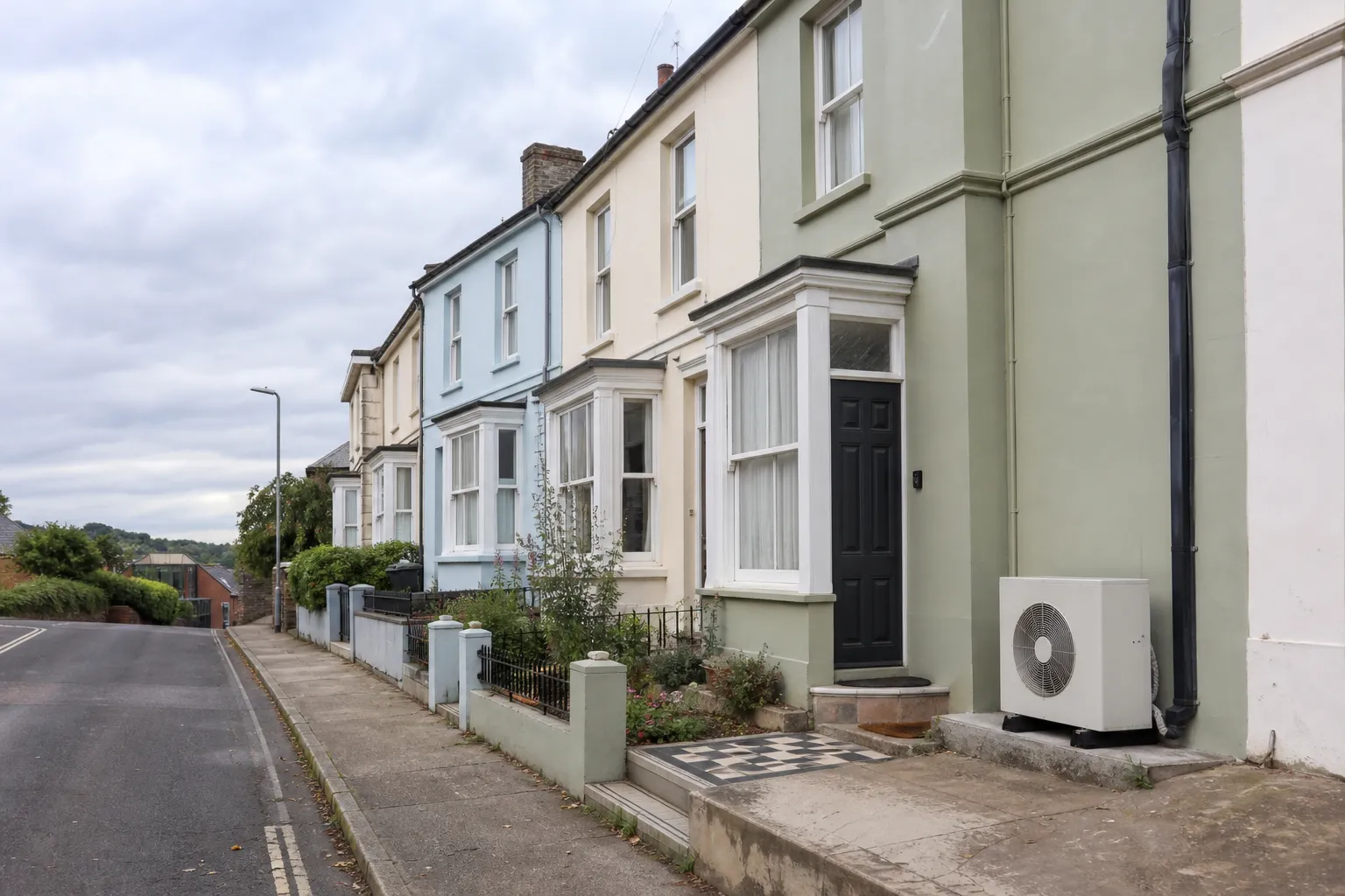Bristol street of victorian terraces on the city's hills with an air source heat pump